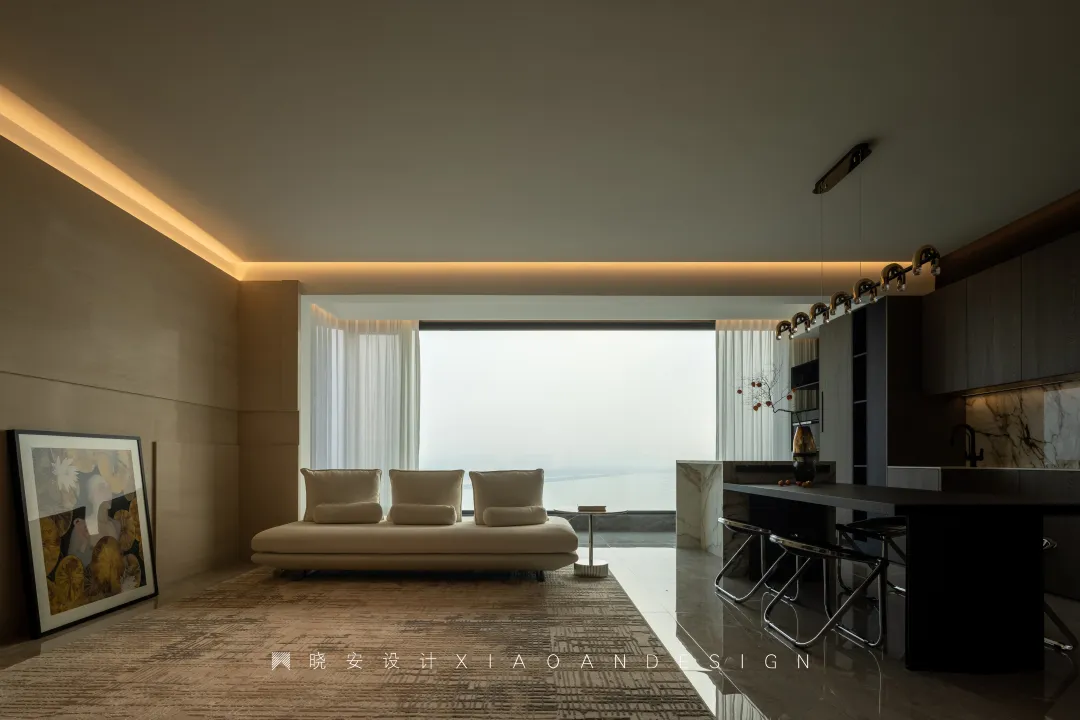  Design is an art that adds beauty and meaning to life—— Thomas Marvin's living room is located along the lake, which is a trace of nature. The case is located near the Taihu Lake. In order to give the residents the best view, we removed the sliding door of the balcony in the original space