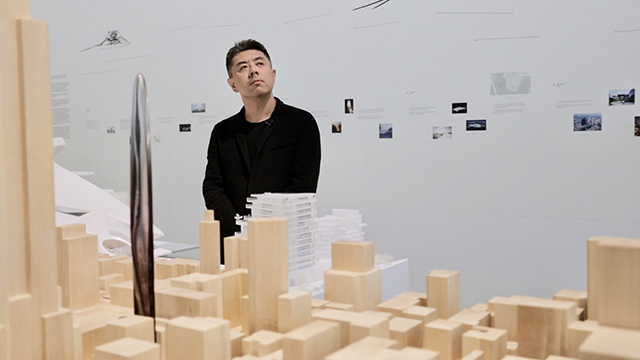 Ma Yansong at MAD X exhibition in Paris.jpg