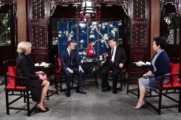国家主席习近平和夫人彭丽媛在上海会见法国总统马克龙和夫人布丽吉特